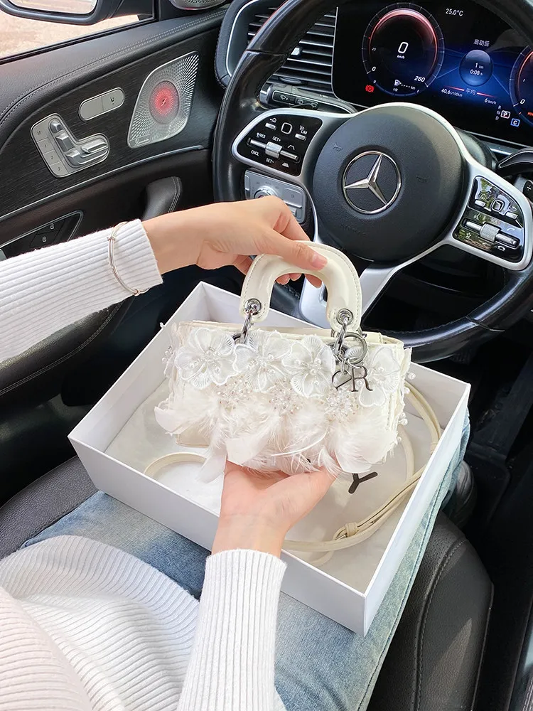 

Luxury and Delicate Handheld Square Bag with Premium Pearl and Exquisite Feather Tassel 2026 Women's Newly Trendy Shoulder Bag