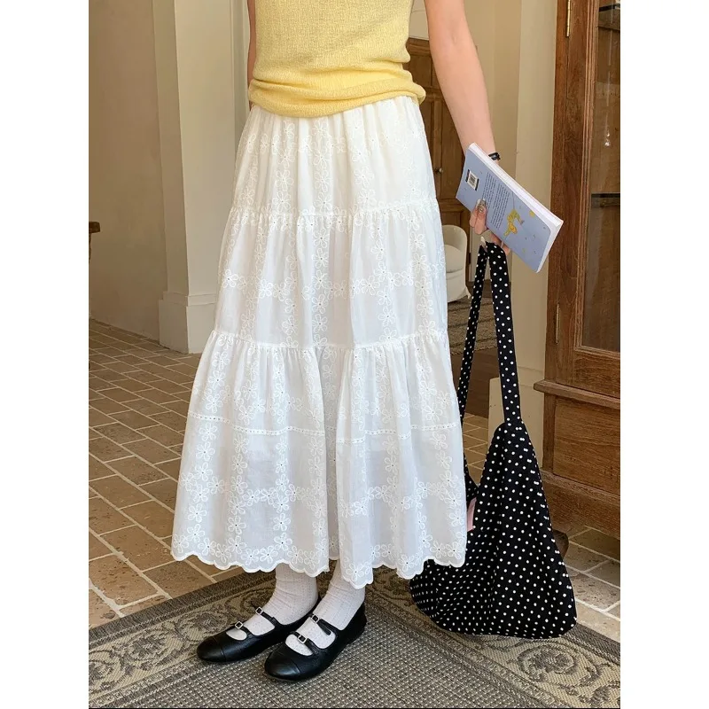 

New Fashion Style Hollow Embroidery Skirt Women White Floral Skirt High Waist Ruffle Long Skirt Casual Summer Vacation Wear OWK6