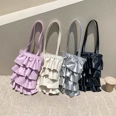 One-shoulder bag women\'s pleated skirt bag Joker sweet fashion flounces big brand design fashion creative new purse