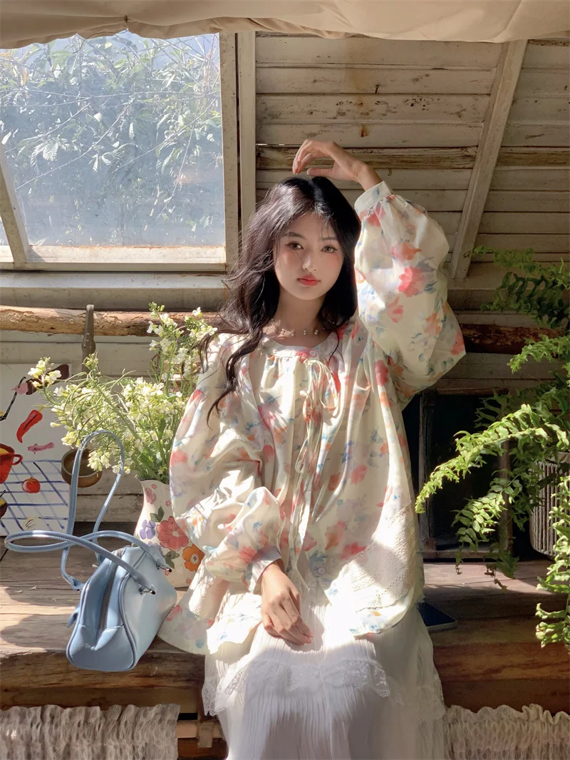 

Off Sweet Plaid Long Sve irt Women's round Ne Print Belt Korean Sle Loose Gentle Fall Season Bubble Sve Blouse