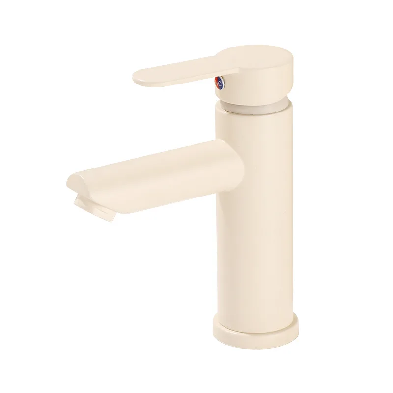 

Cream White Bathroom Washbasin With Hot And Cold Water Faucets. Hotel-Style Household Basin With Single-Hole Faucet.