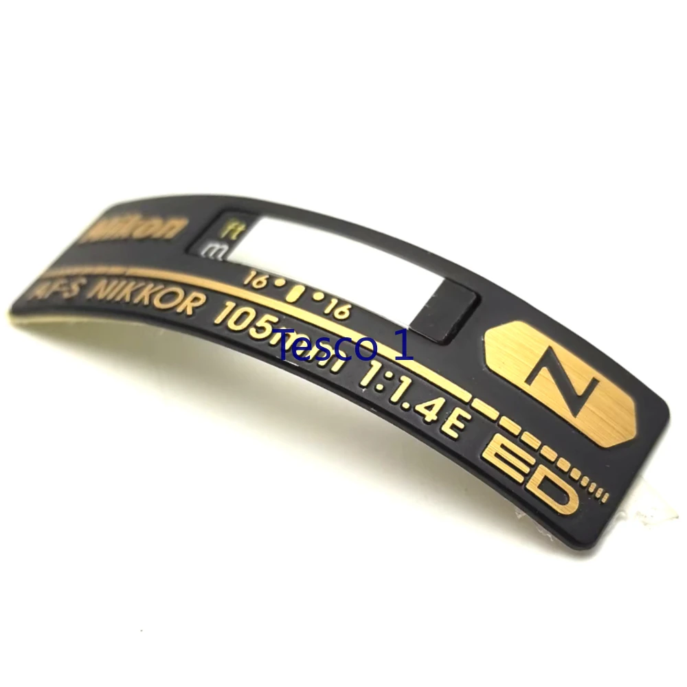Nuove parti della fotocamera per Nikon AF-S Nikkor 105mm f/1.4E ED 35 mm 1:1.4 G Logo Mark Targhetta Etichetta DSLR Parte di riparazione della fotocamera