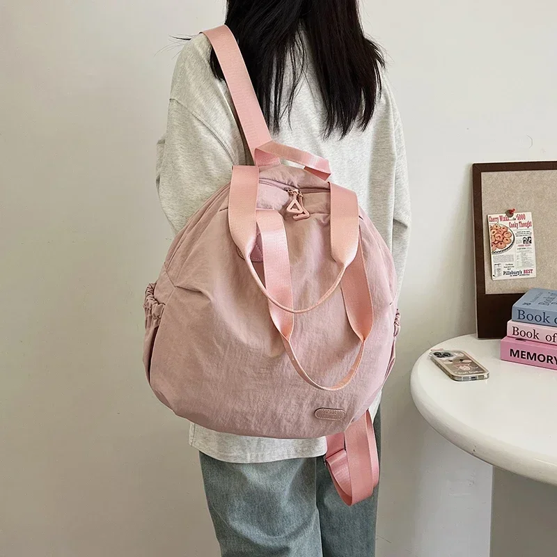 حقائب مدرسية من النايلون ذات سعة كبيرة وسحاب حقائب نسائية صلبة خفيفة الوزن للبيع 2025 حقائب ظهر عالية الجودة