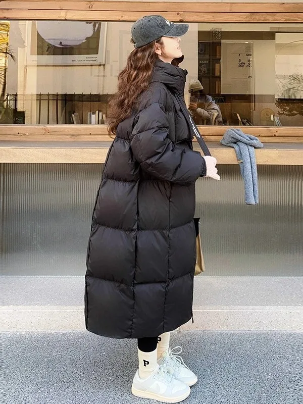 

Черная длинная пуховая куртка из хлопка для женщин, зимнее утепленное пальто, стильная верхняя одежда, повседневный стиль, свободный крой, на молнии