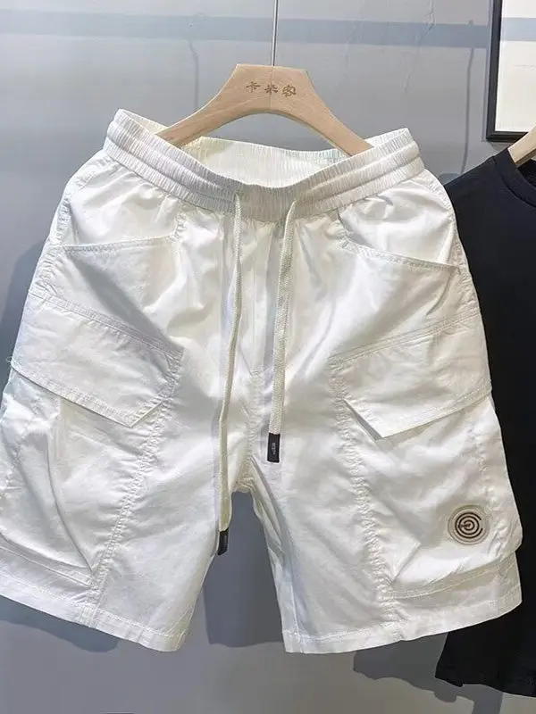 سراويل قصيرة عصرية للعمل للرجال صيفية بنمط جديد وسيم فضفاض بخصر مطاطي مستقيم الساق سراويل غير رسمية بخمسة أرباع