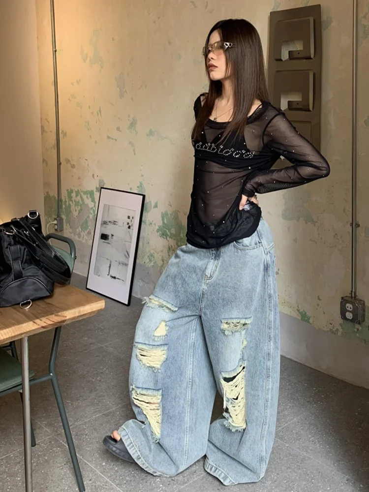 بنطلون جينز نسائي أمريكي عصري بمقاسات كبيرة، تصميم مثير مع فتحات، فضفاض وطويل يصل للأرض، يساعد على تنحيف الجسم