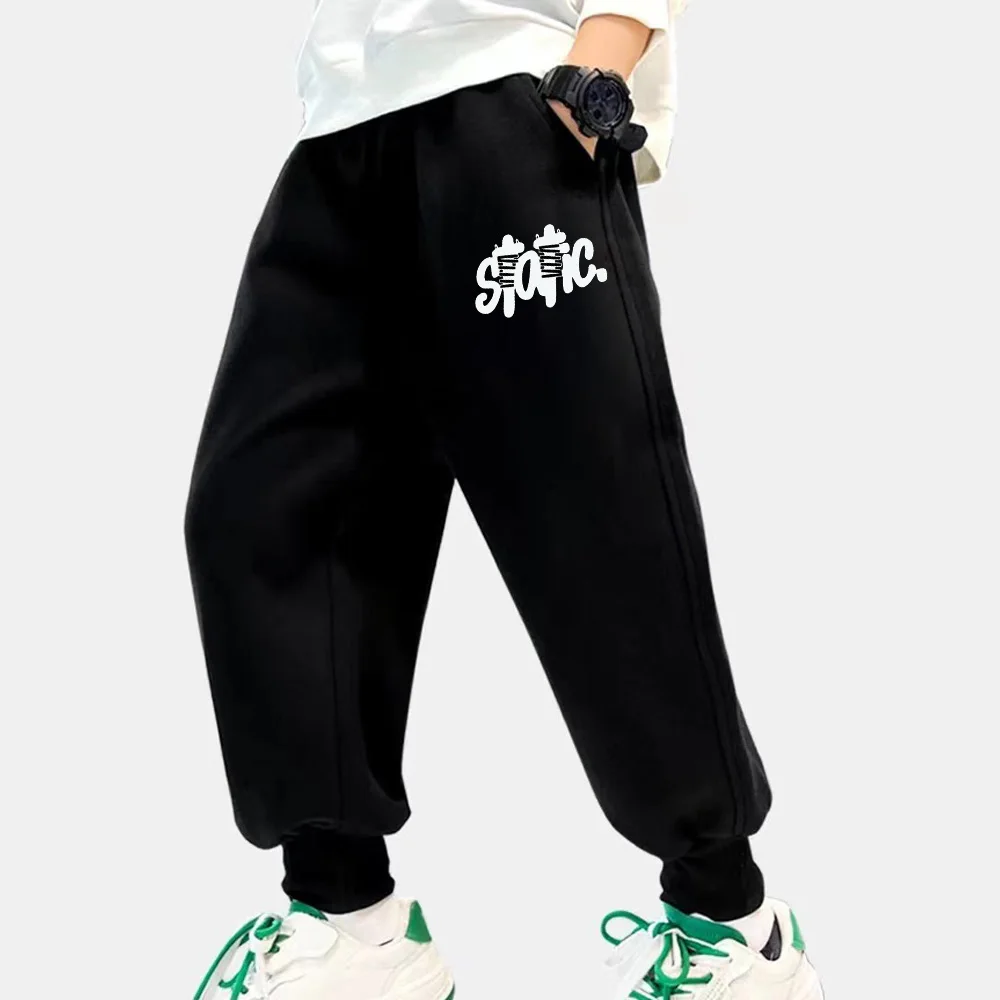 Autumn children's nine-point pants Children's casual black slash letter-printed pants for boys and girls girdle feet sweatpants