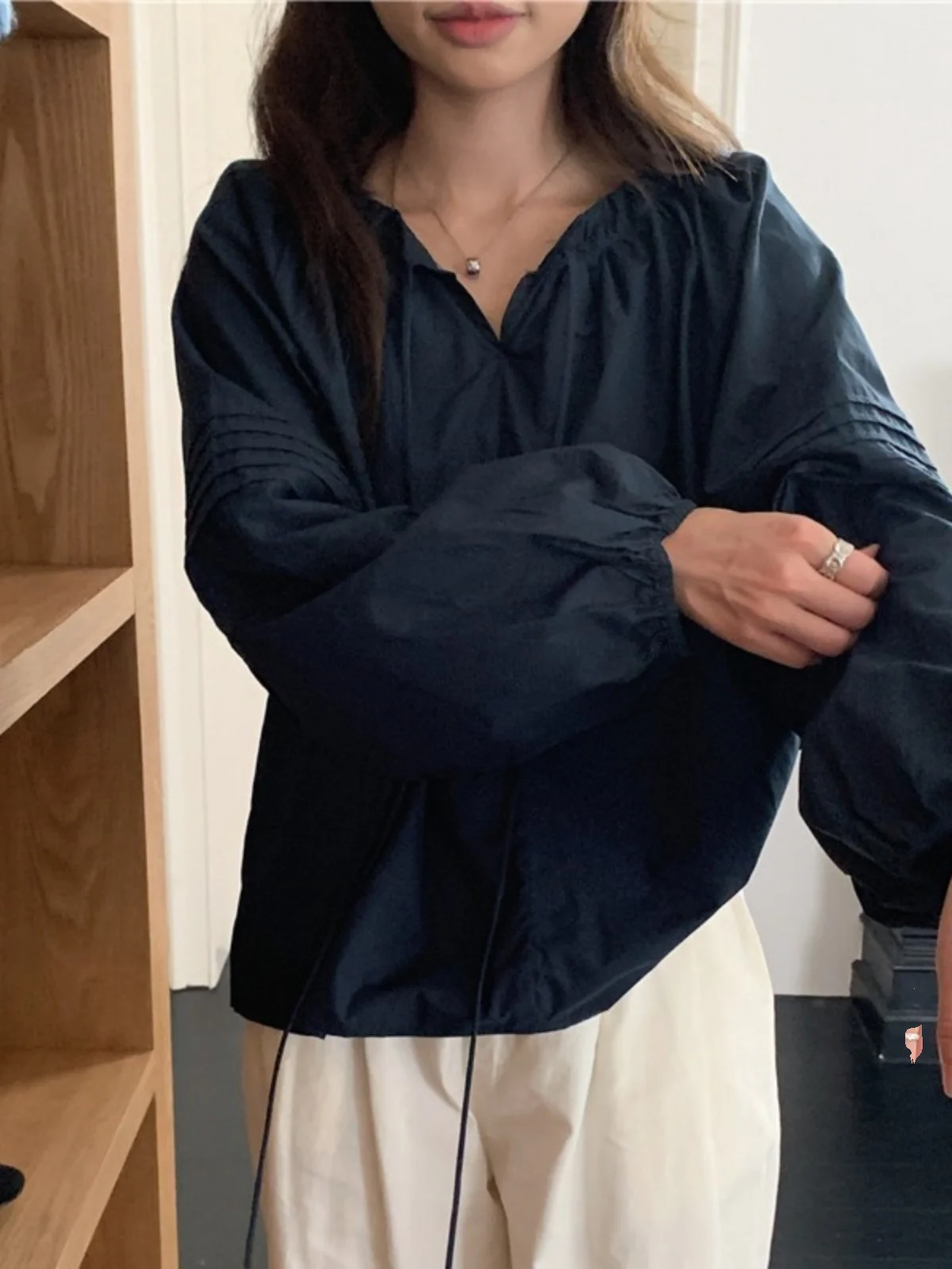 Csa de muñeca de manga larga de estilo coreano para mujer, Top de alta moda con reducción de edad, manga acampanada hoad...