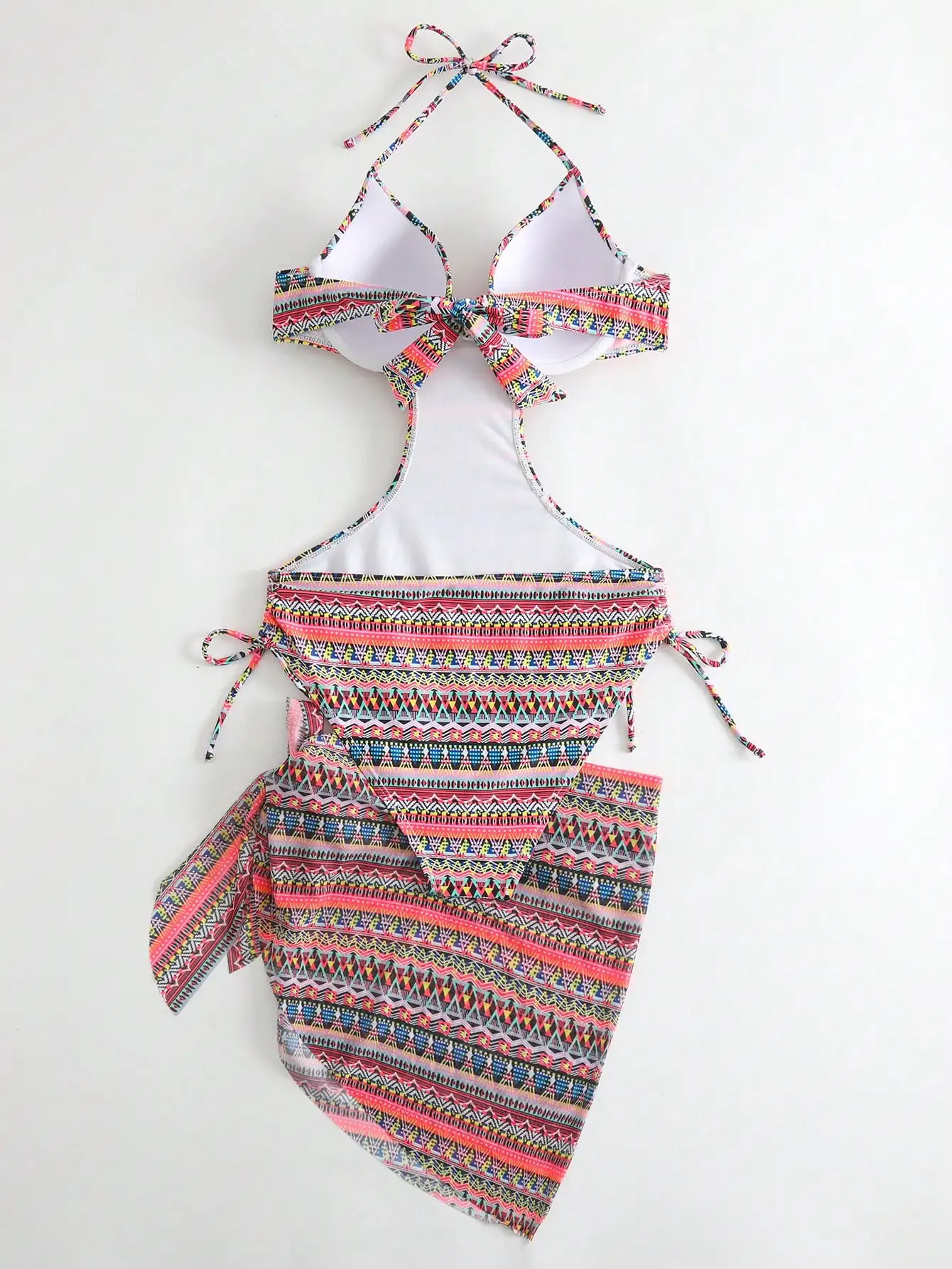 

Комплект бикини с геометрическим принтом и вырезами, с пляжной юбкой