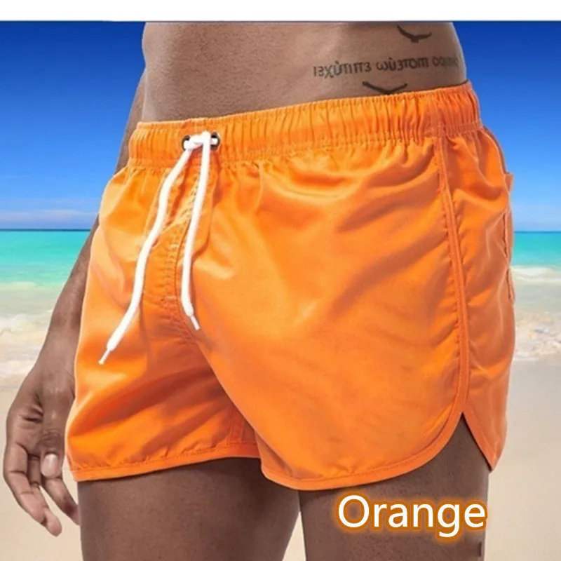 Cross-border European and American summer beach shorts Men's breathable casual solid color running training sports shorts