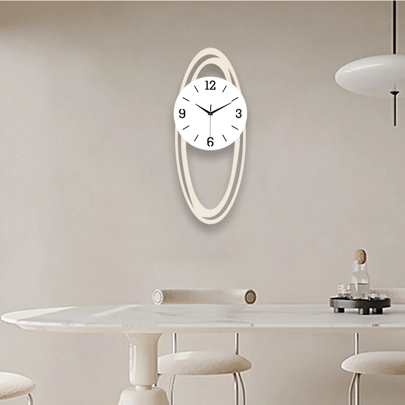 Oval modern minimalist wall clock with modern art style suitable for home and office coffee shop decoration
