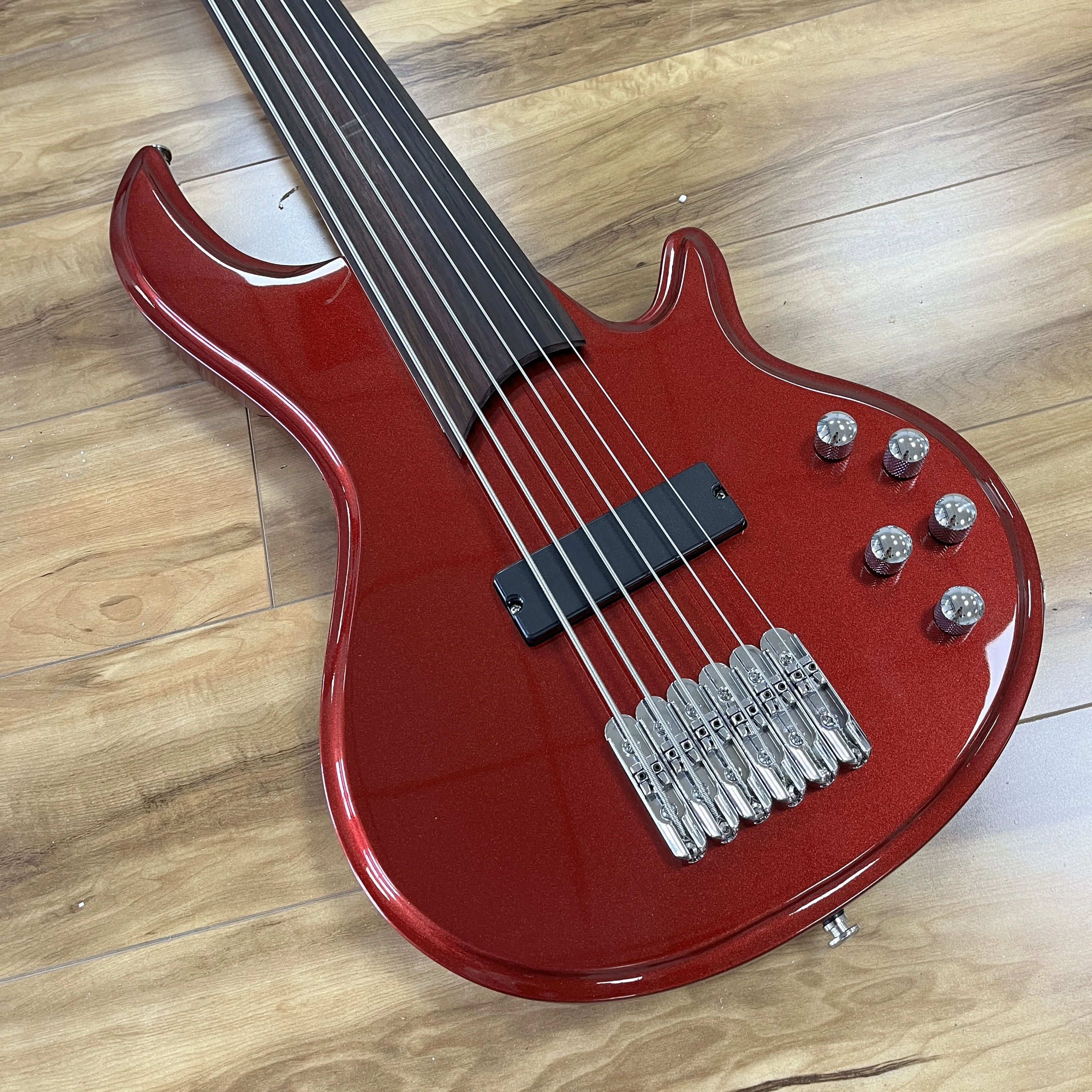 

No frets bass electric guitar red Basswood body Maple neck Characteristic Electric Guitar-Themed Gift Free Shipping