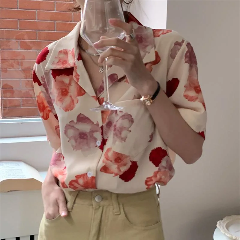 Sommer neue Frauen Turn-Down-Kragen Knopf gedruckt Krawatte Dye gespleißt Taschen Mode Prärie Chic lose halbe Ärmel Bluse Shirt