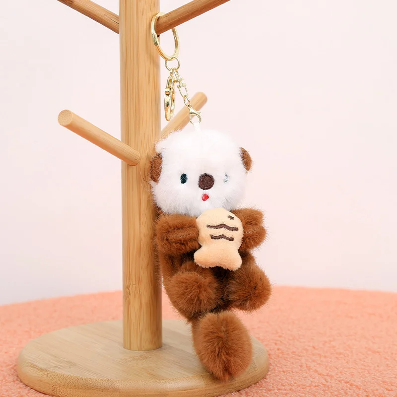 ZAKOL lindas lontras sosteniendo peces llavero colgante de felpa mochila llaveros colgante bolsa llave cartera colgante al por mayor