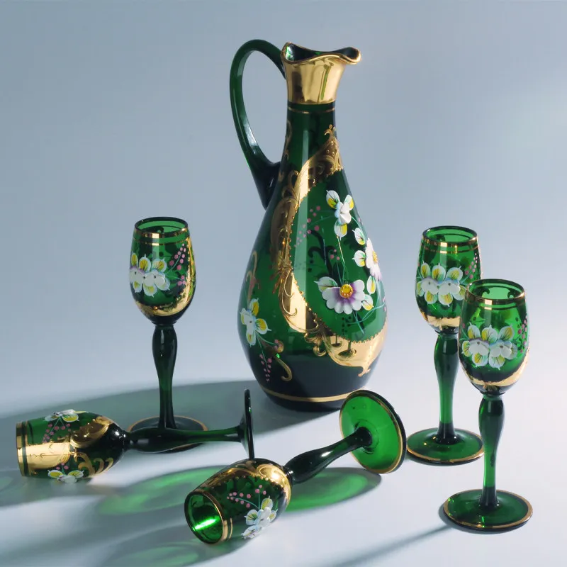 Elegant crystal champagne goblet featuring hand-painted European and Bohemian motifs in green blue purple hues embossed enamel f