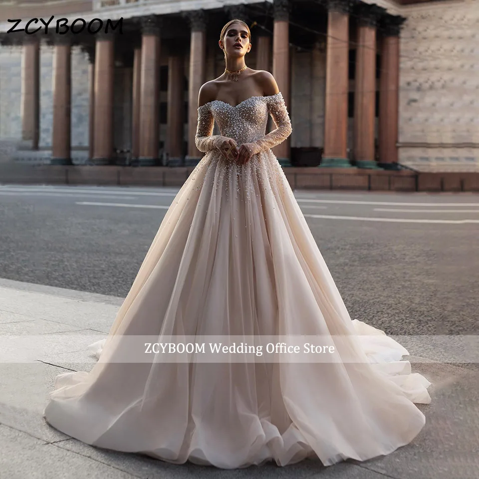 Luxury Off Shoulder Glitter Pearls Beading Wedding Dress 2026 Princess Ball Gown Long Sleeves Women Bride Gowns Vestido De Noiva