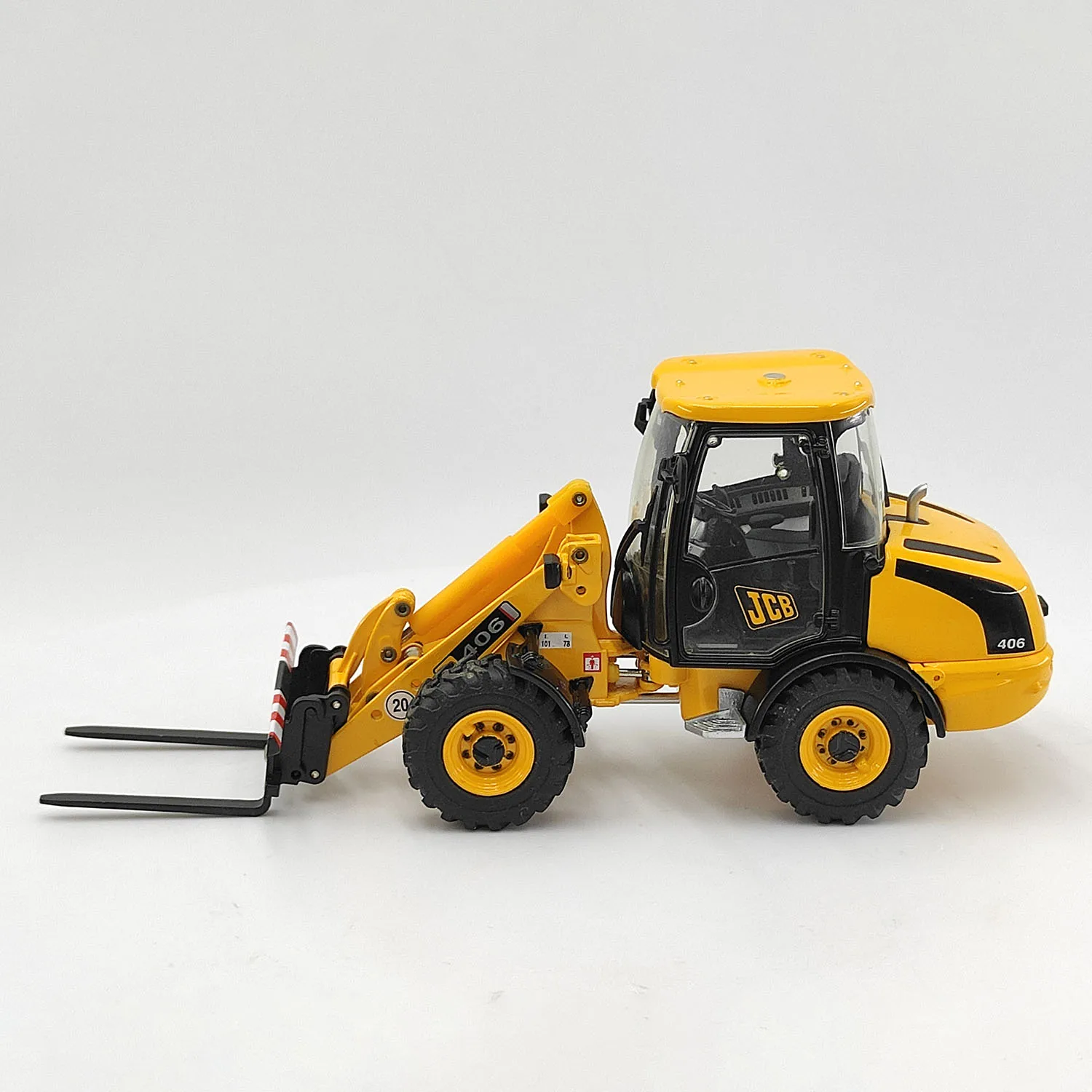 دييكاست JCB 1:35 مقياس JCB 406 عجلة تحميل رافعة شوكية سبيكة سيارة نموذج تحصيل لعبة هدية تذكارية عرض حلية