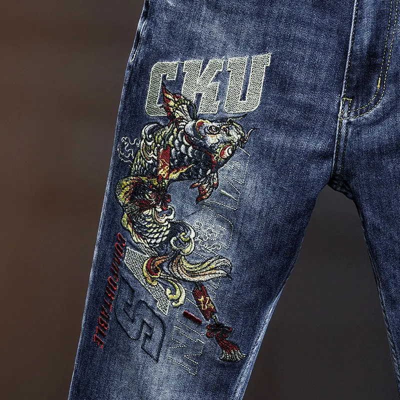 2024 high-end Chinese style koi embroidered jeans men's street design sense embroidered slim fit Pu Shuai casual feet trousers