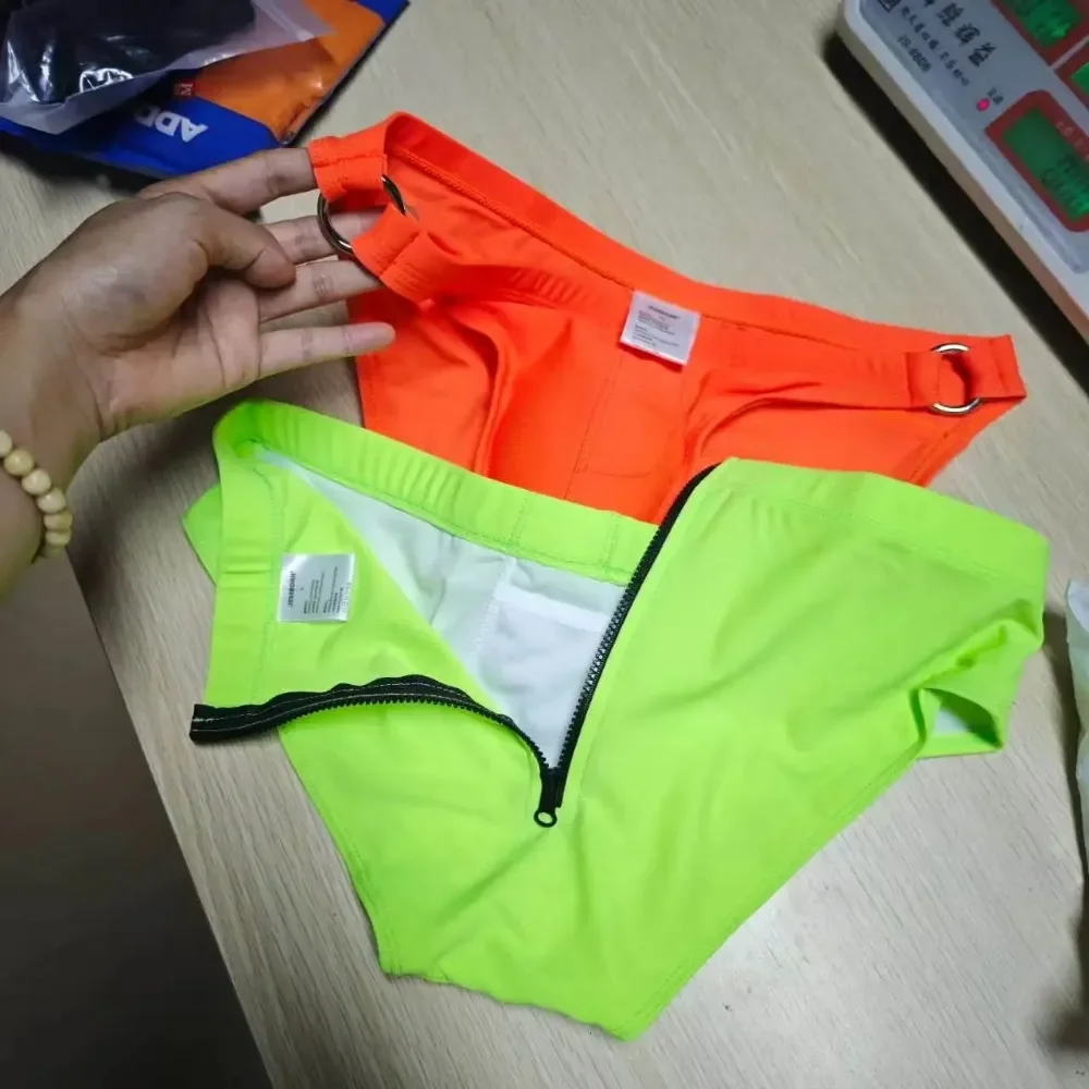 New Warehouse Spot New real shot Men's solid color fashion metal buckle swimming pants close-fitting full hip surfing 10098