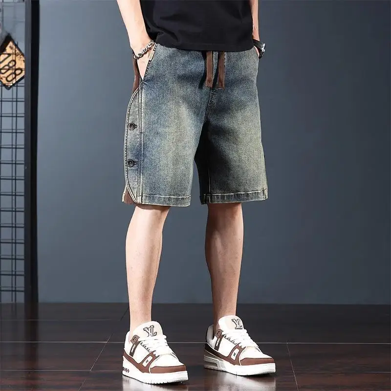 กางเกงขาสั้นผ้ายีนส์เฮฟวี่เวทอินเทรนด์ของผู้ชายสําหรับฤดูร้อนกางเกงห้าจุดประกบอเมริกันหลวม