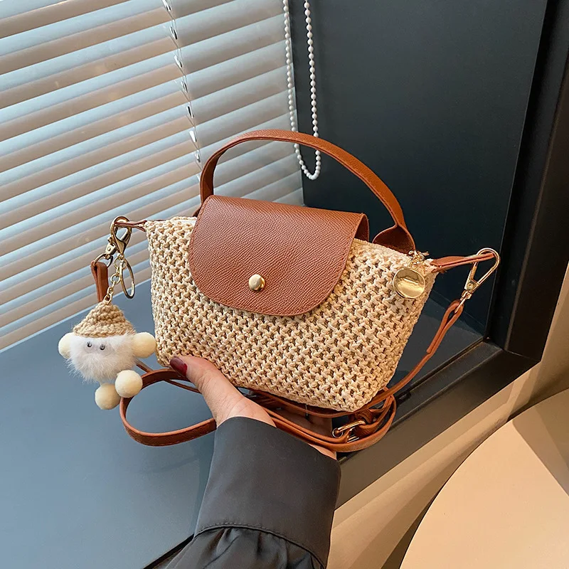 

Summer woven lid splicing portable mini straw bag seaside vacation hairball beach dumpling bag