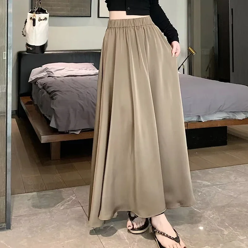 ファッションエレガントなプリーツスカートの女性 2025 新しい夏のアイスシルク固体カジュアルロングスカート女性ハイウエストすべて一致パーティースカート