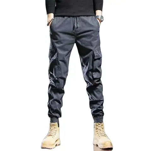 Autunno inverno nuove tasche elastiche in vita oversize pantaloni Cargo Vintage pantaloni Harem con lacci All-match moda Casual allentati maschili