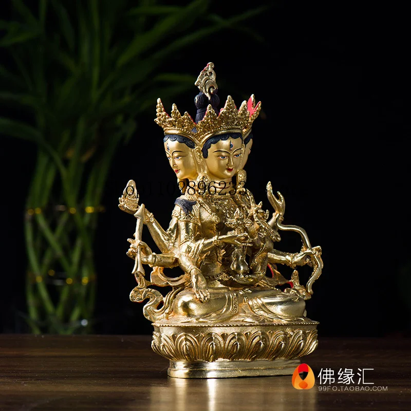 7A small, domestically produced Nepalese bronze statue of the Vairocana Buddha, entirely gilded Tibetan Buddhist ritual items an