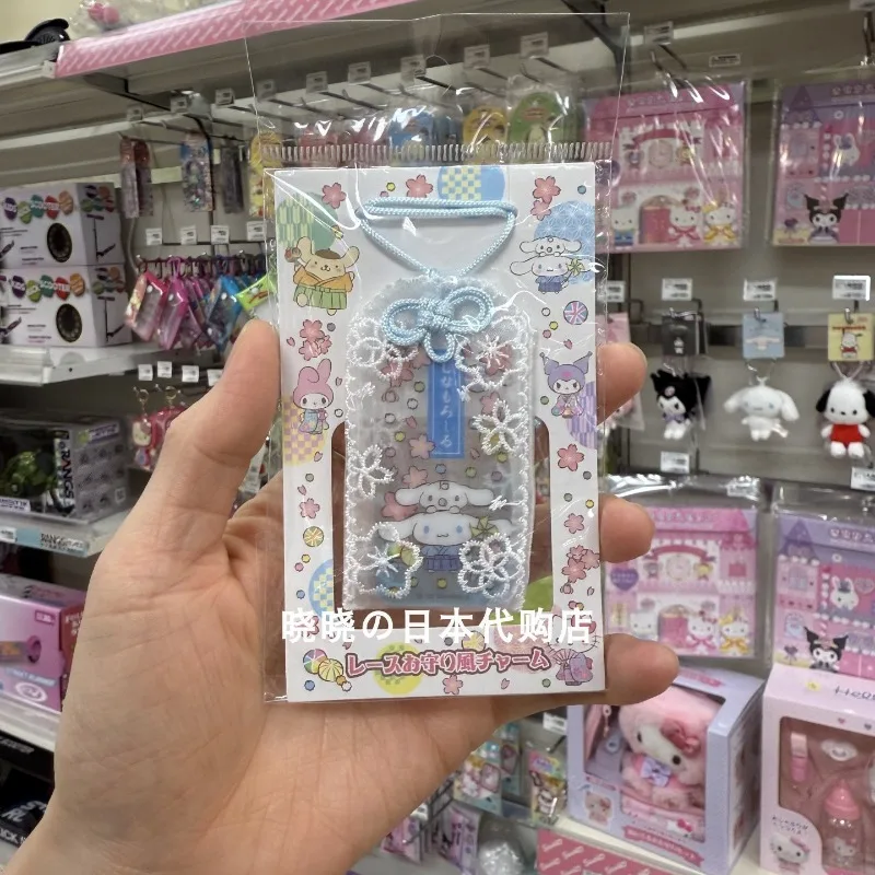 Nuevo Sanrio Kitty Melody Kuromi Cinnamoroll pompón Purin encaje Omamori bolsa Mini llavero correa de teléfono Anime juguetes colgantes de felpa