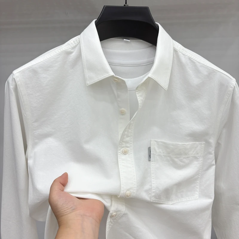 Camisa de lyocell de alta calidad de otoño para hombre, solapa de color sólido, nueva ropa de abrigo de manga larga con bolsillos, tops de moda de ocio para hombre