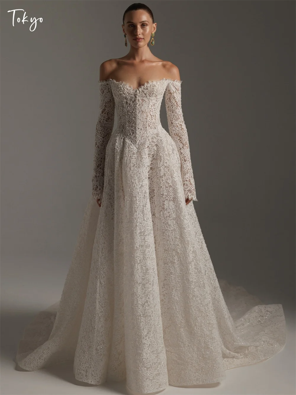 

Tokyo Customized White Off the Shoulder Wedding Dresses Long Sleeves Zip Back Bridal Gowns A-Line Court Train Wedding Gowns 2026