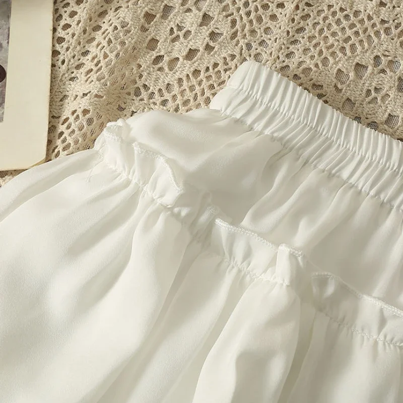 女性のための伸縮性のあるウエストミニスカート,カワイイバケーション,無地のフリル,シックなデザイン,甘いボールガウン,韓国のファッション,夏,y2k