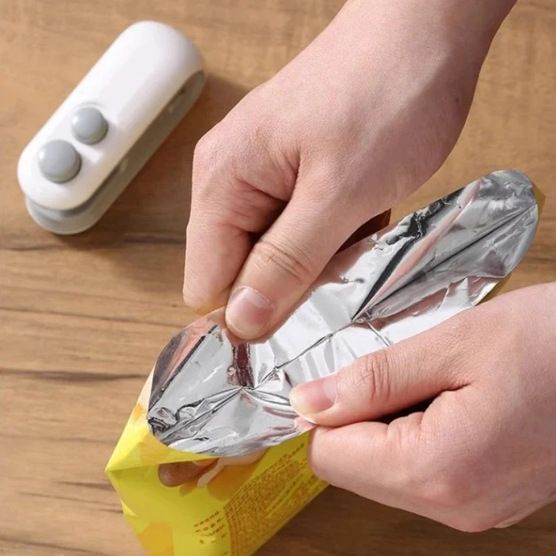 Xiaomi Youpin เครื่องซีลถุงความร้อนขนาดเล็ก เครื่องซีลปากถุง เครื่องซีลอาหารพลาสติก คลิปถุง เครื่องซีลมือถือ เครื่องซีลอาหาร ความร้อน ใหม่