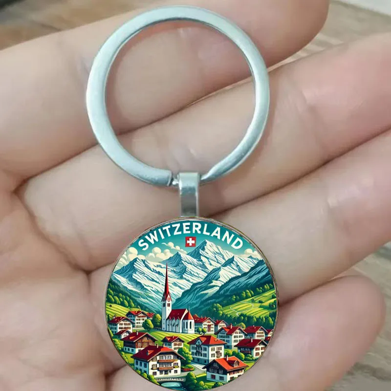 Llavero circular con paisaje de campo suizo