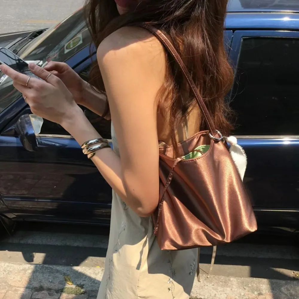 

Satin Silk Underarm Bag 2026 New Niche Minimalist Commuter Bucket Bag Korean High-end Portable Shoulder Texture Unique Fashion