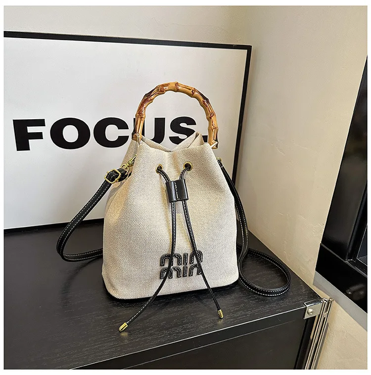 

Women’s Canvas Drawstring Hobo Bag 2026, Spacious Bucket Bag with Top Handle, Versatile Casual & Work Shoulder Purse