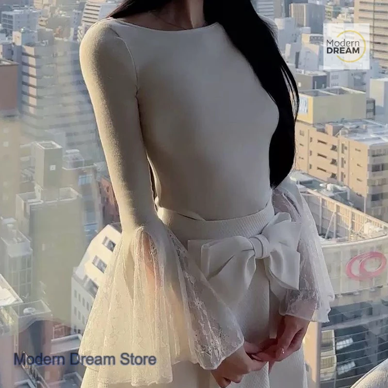 

Korean lace stitching hem horn bottoming T-shirt women's spring and autumn new slim slim western style design long-sleeved shirt