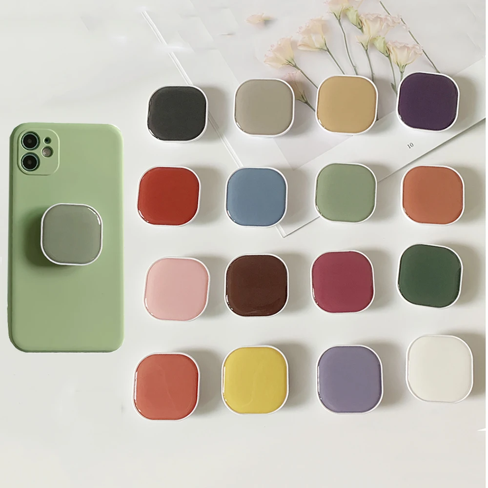 แหวนพับได้สีทึบทรงสี่เหลี่ยมที่วางโทรศัพท์ iPhone ที่วางโทรศัพท์ซ็อกเก็ตรองรับ Samsung ที่วางด้ามจับกระเป๋า