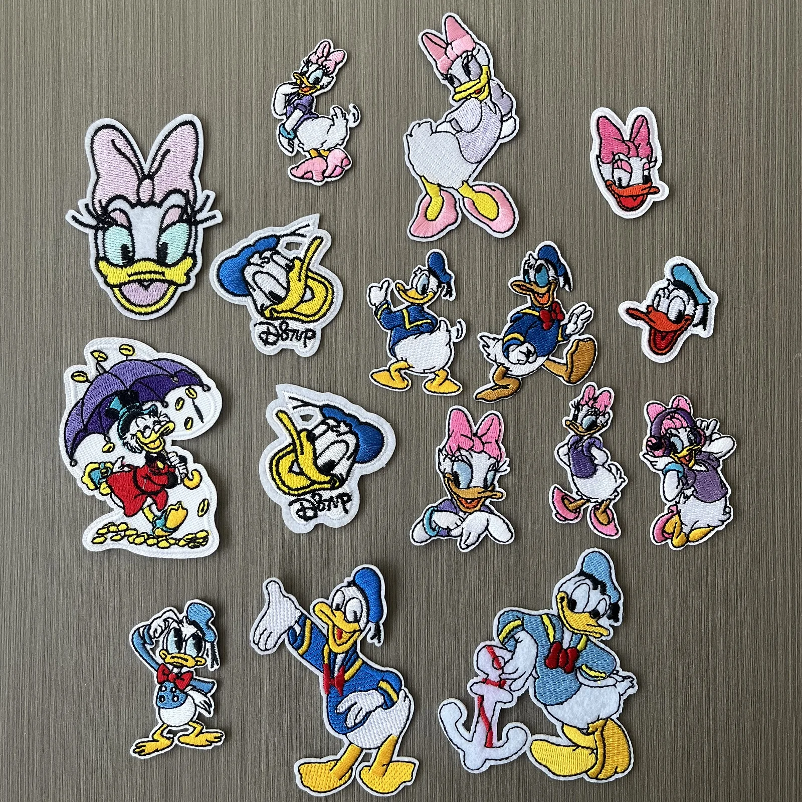 

16Pcs Cartoon Donald Duck Disney Cute Daisy Duck Iron on Embroidery Patches for on Child Clothing Jeans Clothes Appliques