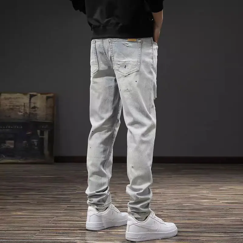 Korean fashion designer men's blue jeans retro elastic slim fit patchwork retro jeans men's casual denim pencil pants hombre