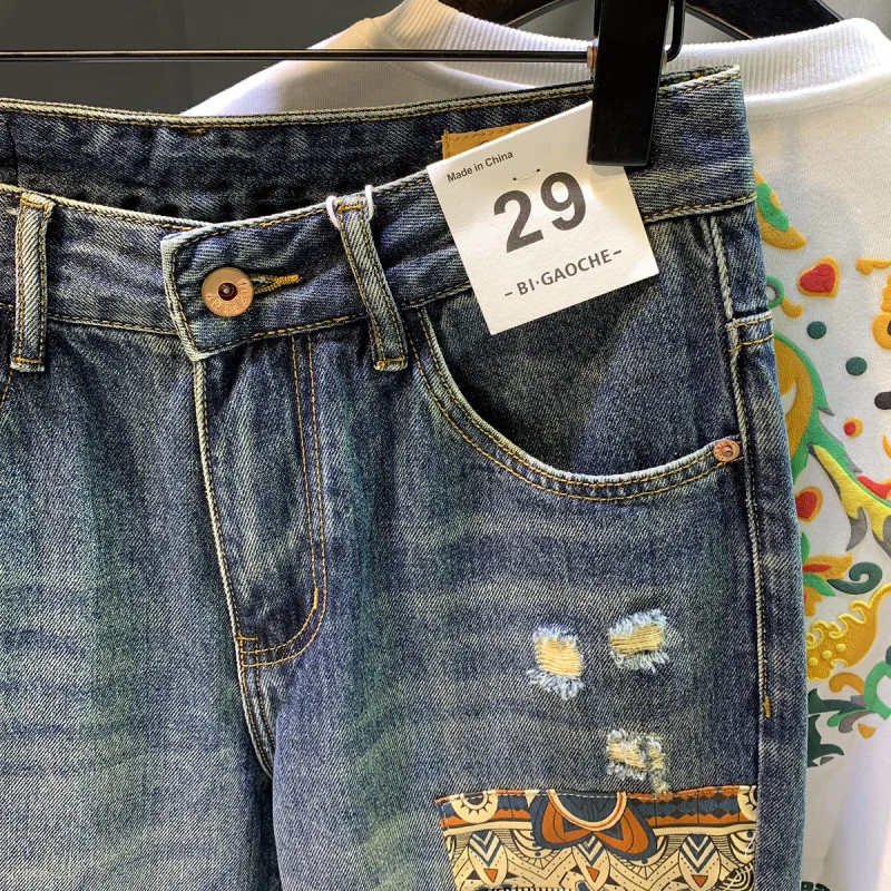 High street retro spring and autumn new style ripped blue jeans men's loose straight tube nostalgic patch printed pants