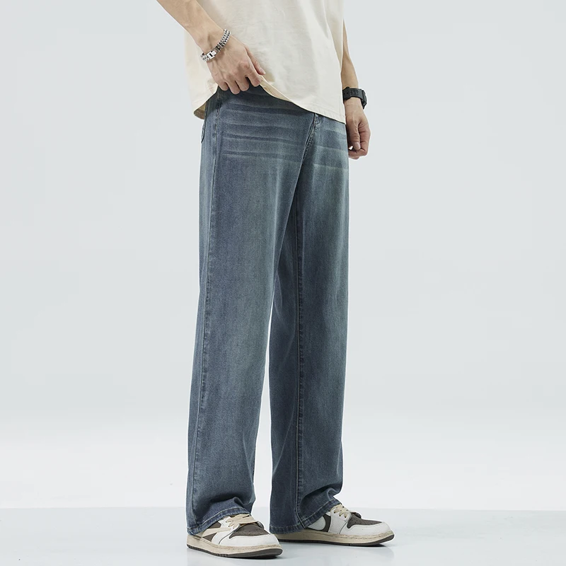 Przytulne męskie dżinsy z miękkiej tkaniny Lyocell Letnie cienkie, rozciągliwe, oddychające, luźne spodnie dżinsowe z szerokimi nogawkami, w pasie, spodnie typu casual