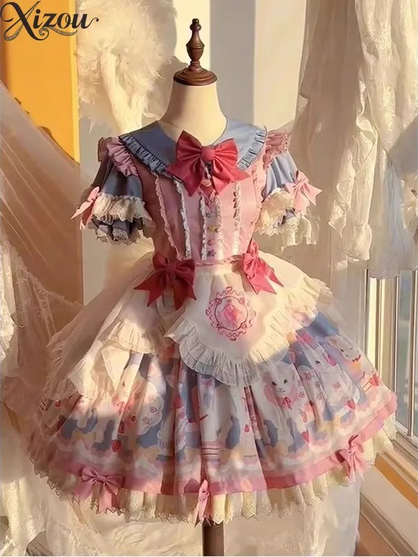 2025 Blu Rosa Lolita OP Abito Grembiule Colletto finto Fiocco Bambola Torta da principessa Stampa cartone animato Vita alta Puffy Festa di compleanno Estate