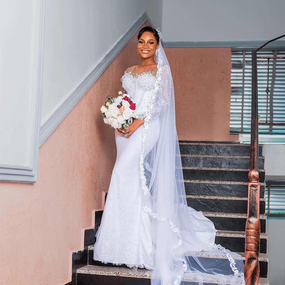 

African Beaded Wedding Dresses Mermaid Full Sleeve O-Neck Applique Lace Bride Gowns Women Customized Sweep Train robe de mariée