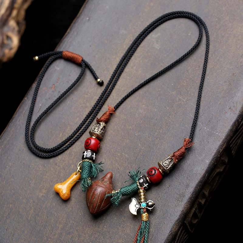 

Niangla Tsatsa pendant sweater chain, copper four-sided Buddha accessory, woven rope necklace