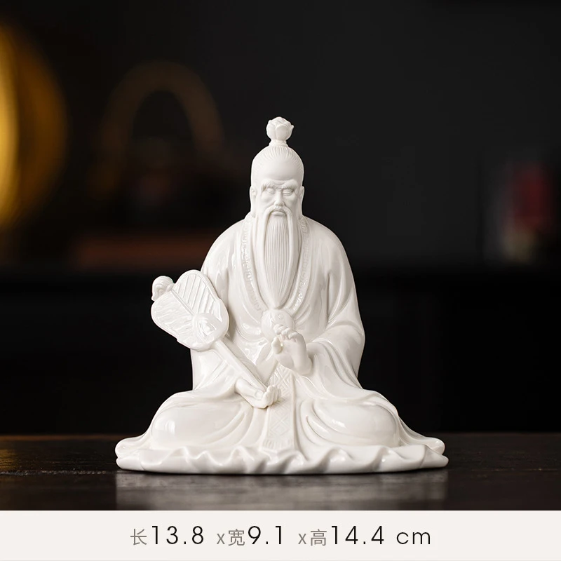 White porcelain statues of the Three Immortals and the Patriarch of the Taoist Religion, including the image of the Patriarch Ta
