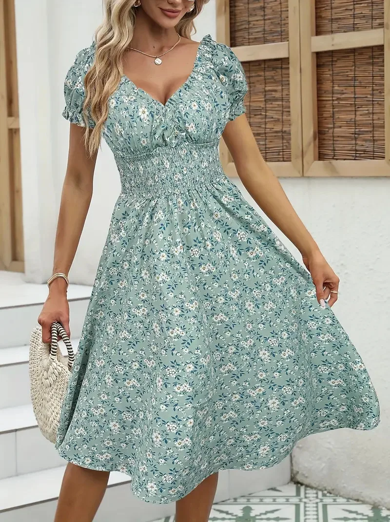 Vintage bloemenjurk met pluizige manchetten en geplooide taille, geschikt voor zomerse strandkleding voor dames en zomerfeesten