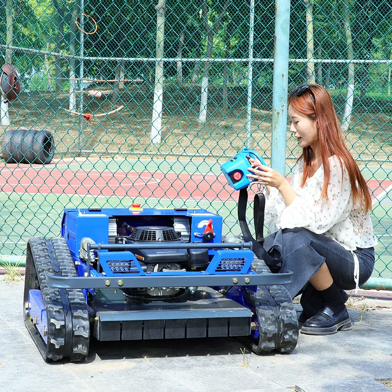 تخصيص صنع في الصين 550mm بدوره قاطع غاز الزاحف التلقائي التحكم عن بعد جزازة العشب للحديقة