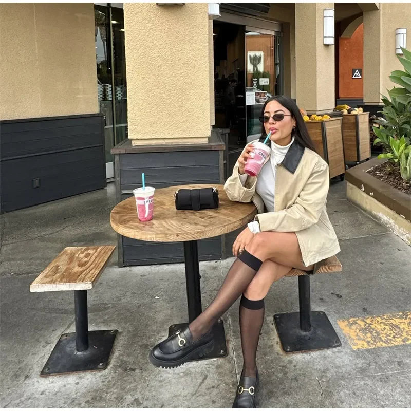 Cross border europeo e americano 2025 Autunno Nuovo prodotto Colletto in pelle PU allentata da donna Splicing Moda casual Top versatile