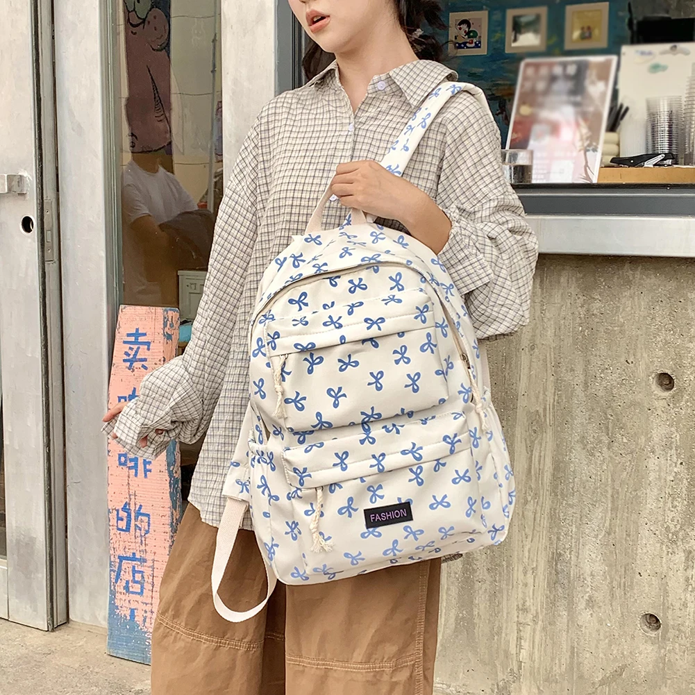 リボンプリントブックバッグプレッピートラベルデイパック中学生バッグ十代の女の子用